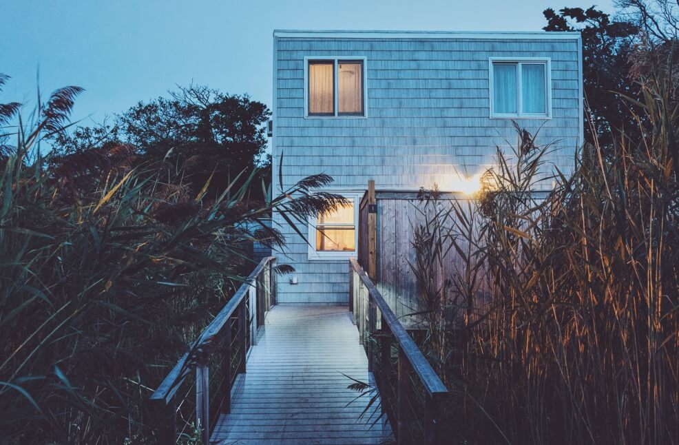 a spooky looking beach house during couldy weather